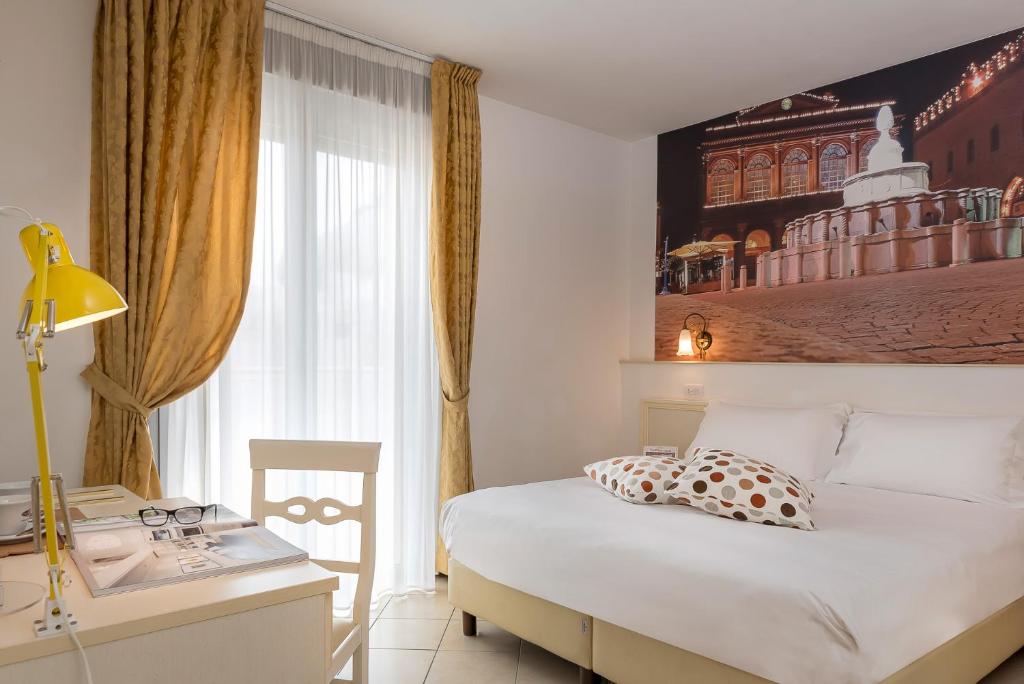 Двухместный (Двухместный номер с 1 кроватью или 2 отдельными кроватями - Подходит для гостей с ограниченными физическими возможностями) отеля Hotel Sovrana, Римини