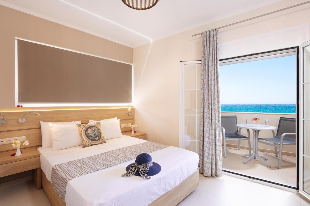 Двухместный (Двухместный номер Делюкс с 1 кроватью или 2 отдельными кроватями и видом на море) отеля Lamon Hotel, Плакиас
