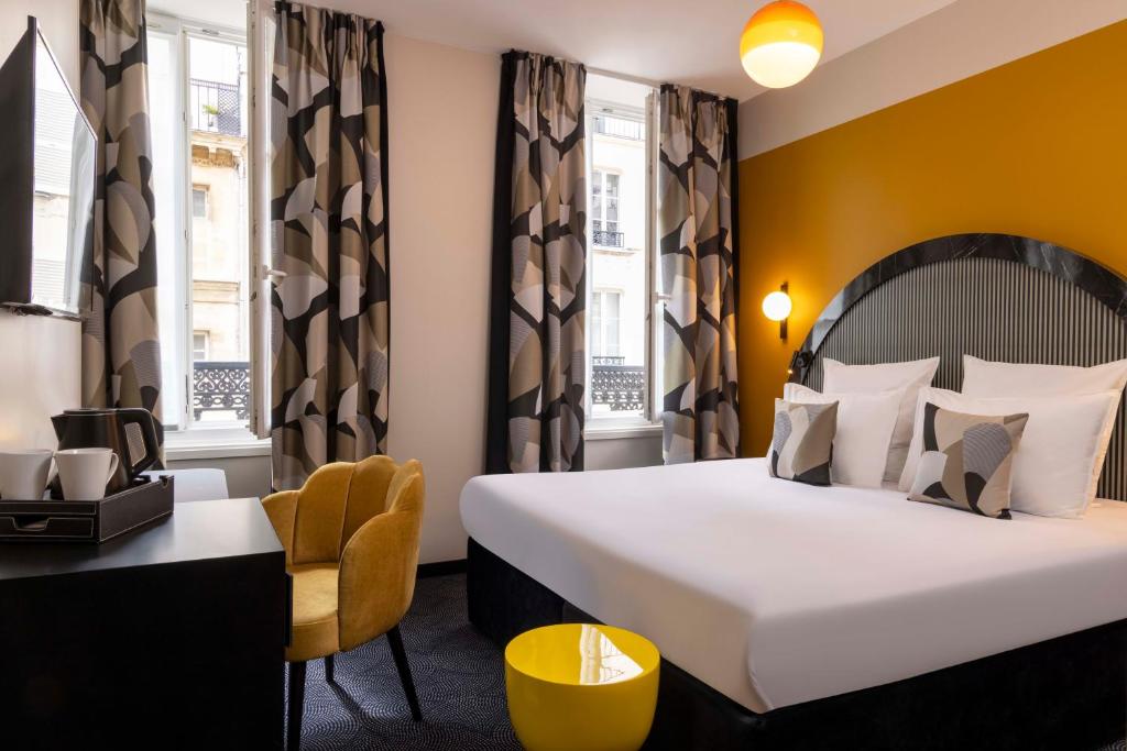 Двухместный (Улучшенный двухместный номер с 1 кроватью) отеля Hôtel Regina Opéra Grands Boulevards, Париж