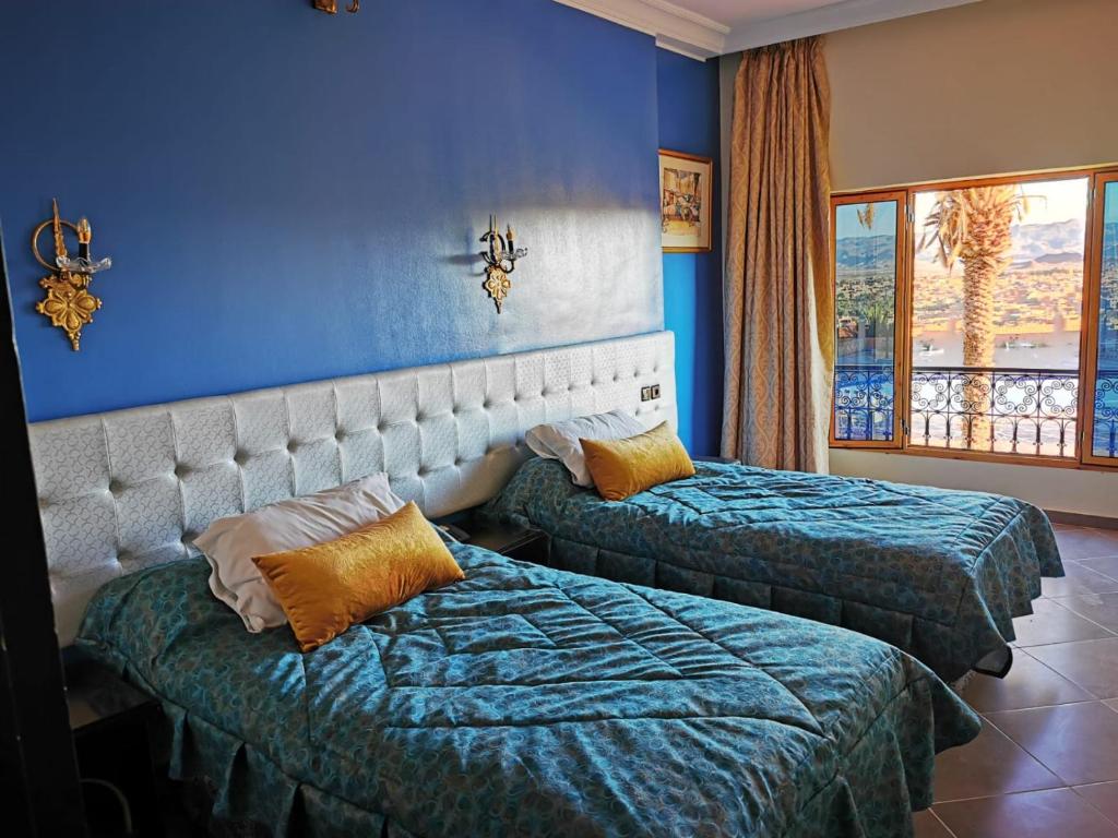 Двухместный (Двухместный номер с 1 кроватью или 2 отдельными кроватями, вид на город) отеля Hotel Saghro, Тингир
