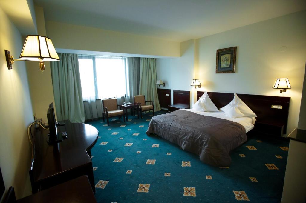 Двухместный (Улучшенный двухместный номер с 1 кроватью) отеля Hotel Delta 4, Тулча