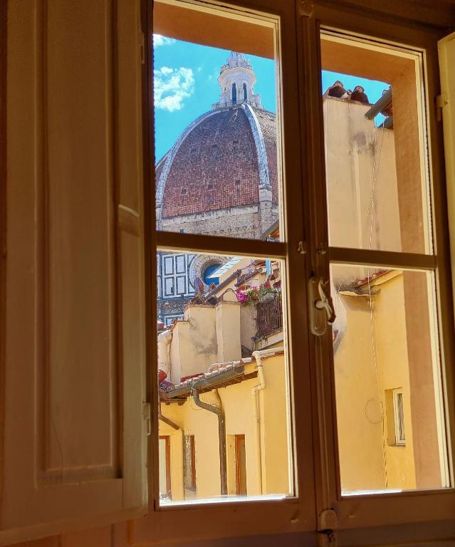Апартаменты (Апартаменты Делюкс с видом на купол Брунеллески) апарт-отеля Granduomo Charming Accomodation, Флоренция