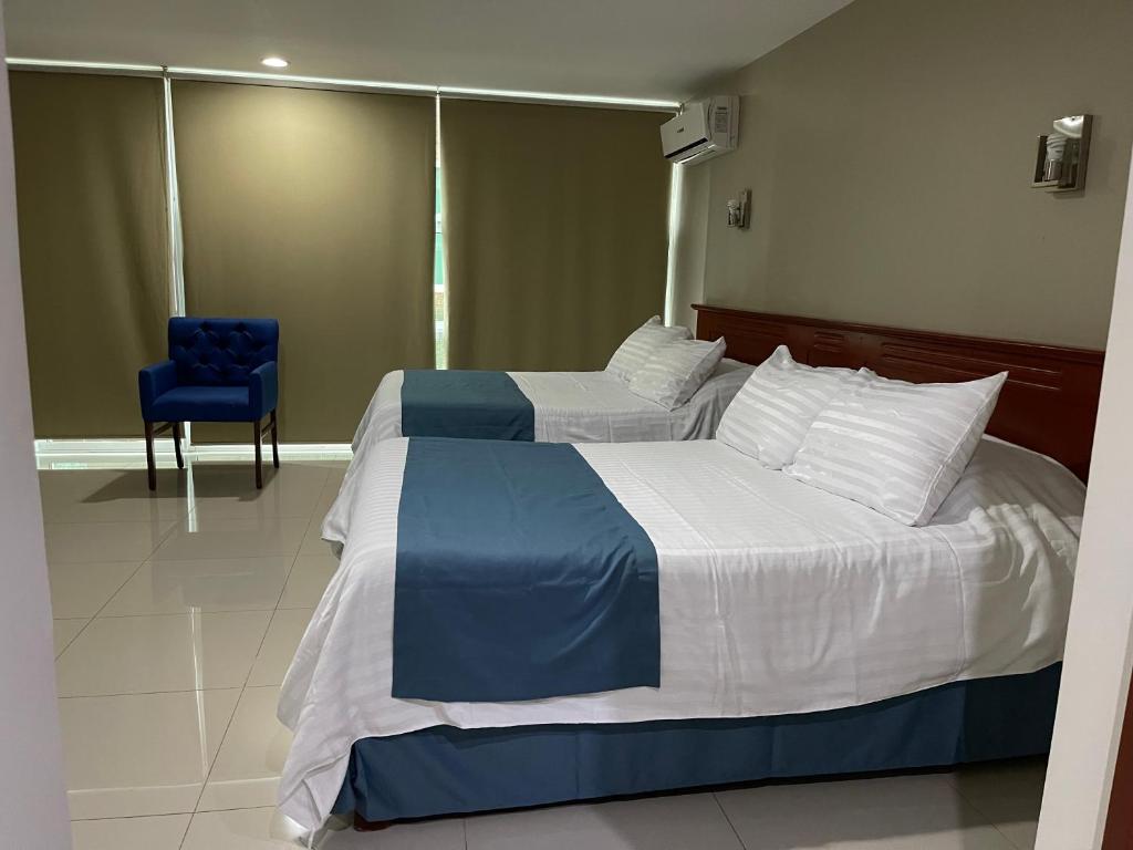 Четырехместный (Номер с 2 кроватями размера «king-size») отеля Hotel Latino, Сахуао-де-Хосе-Мария-Морелос