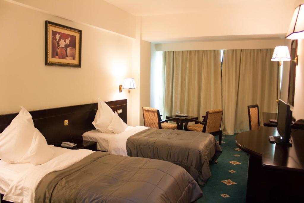 Двухместный (Двухместный номер с 2 отдельными кроватями и окном) отеля Hotel Delta 4, Тулча