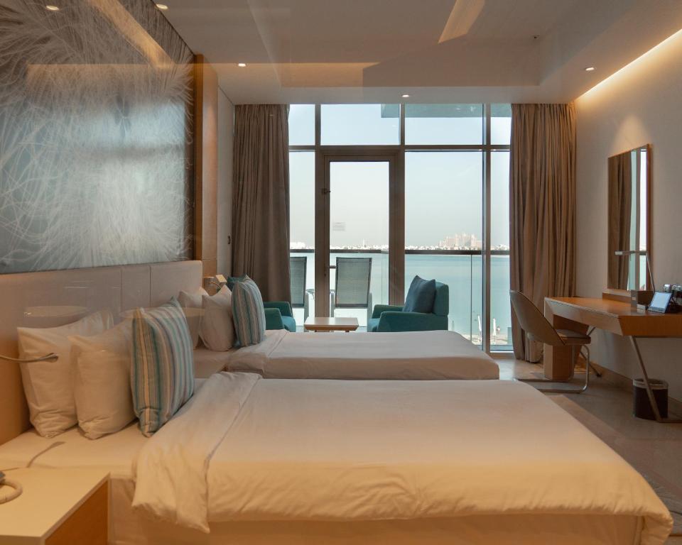Двухместный (Двухместный номер «Премиум» с 2 отдельными кроватями и видом на море) курортного отеля Royal Central Hotel The Palm, Дубай