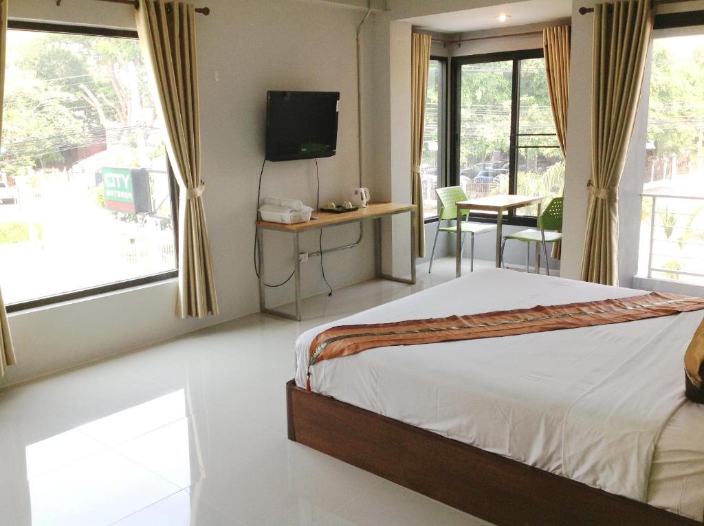 Двухместный (Двухместный номер «Гранд» Делюкс с 1 кроватью или 2 отдельными кроватями) отеля City Ratsada Apartment, Лампанг