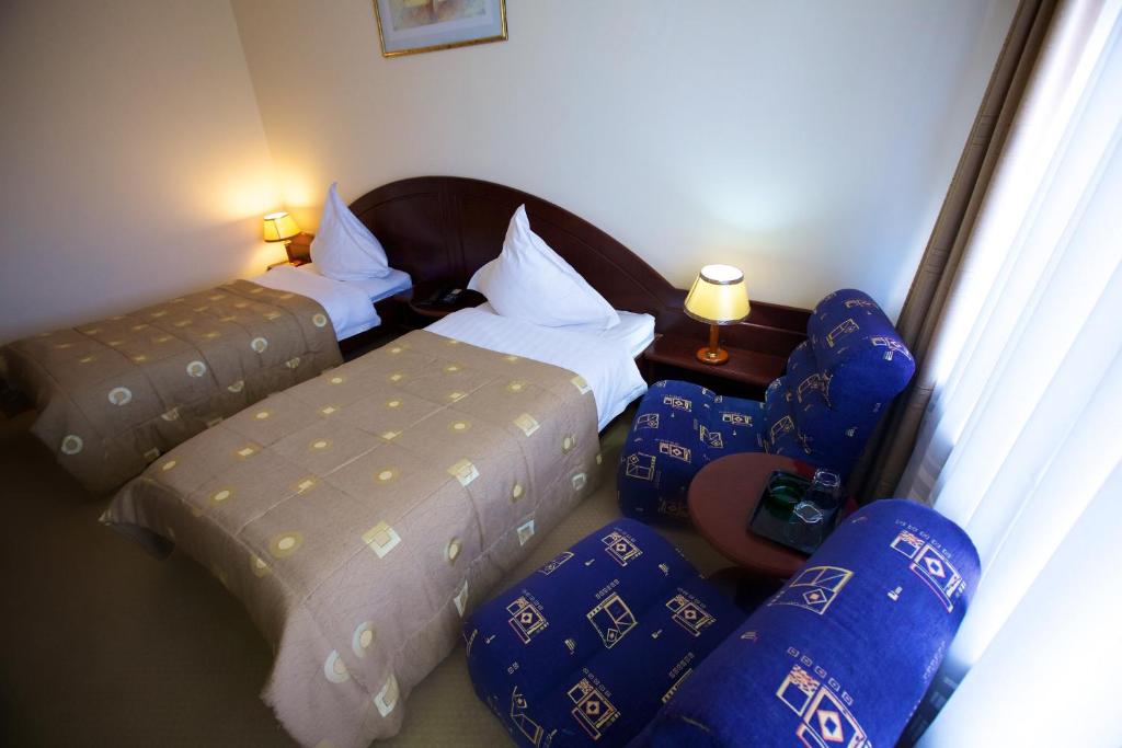Двухместный (Двухместный номер с 2 отдельными кроватями и балконом) отеля Hotel Delta 3, Тулча