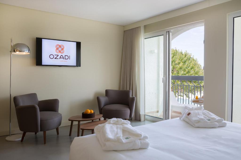 Двухместный (Улучшенный двухместный номер с 1 кроватью или 2 отдельными кроватями) отеля OZADI Tavira Hotel, Тавира