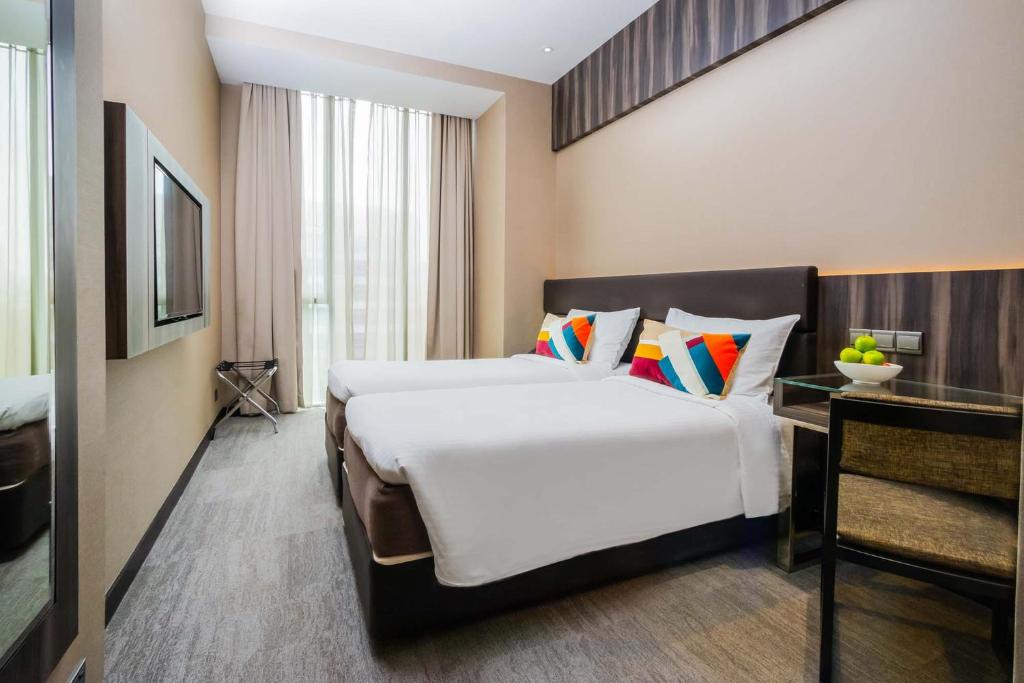 Двухместный (Двухместный номер Делюкс с 1 кроватью или 2 отдельными кроватями) отеля Aqueen Hotel Paya Lebar, Сингапур (город)