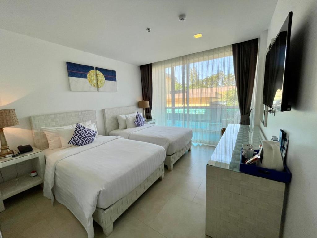 Двухместный (Двухместный номер Делюкс с 2 отдельными кроватями) курортного отеля Sikhara Plago Resort, Чонбури