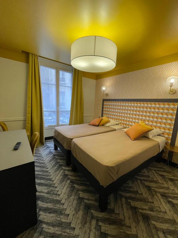 Двухместный (Двухместный номер с 2 отдельными кроватями) отеля Hôtel Gérando, Париж