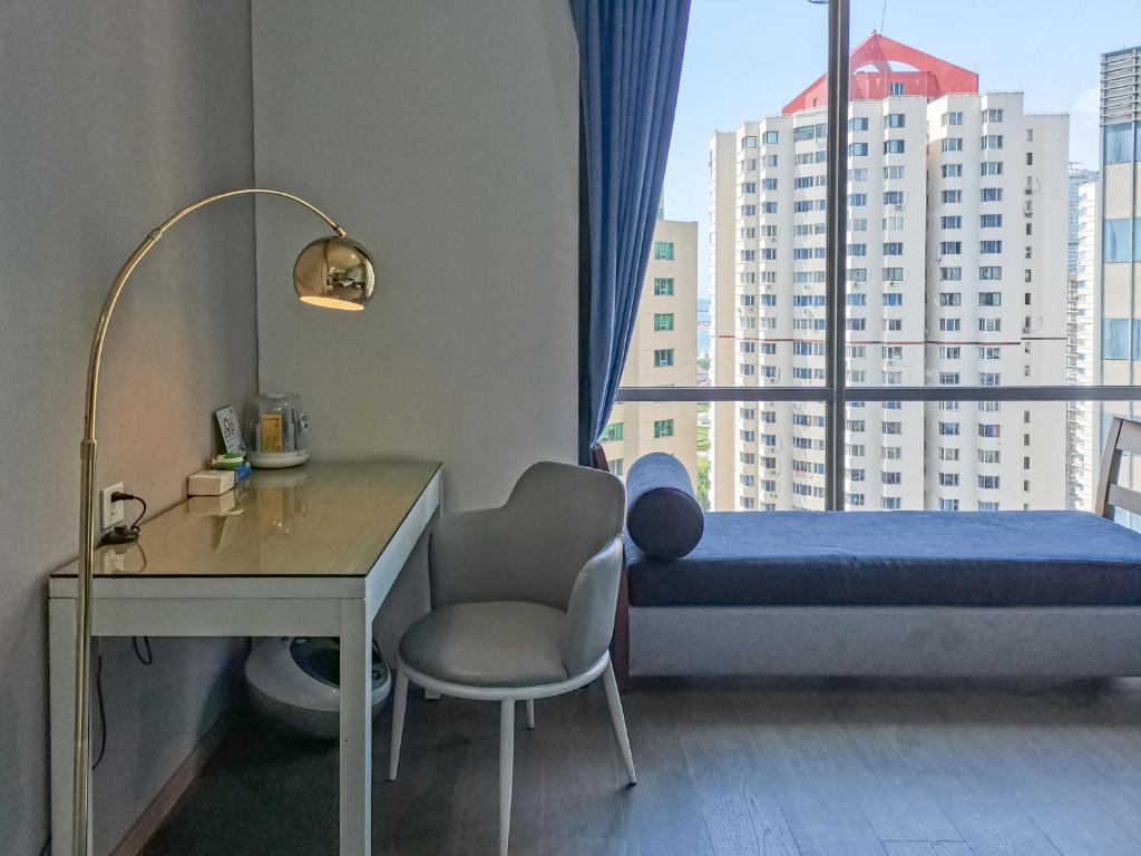 Двухместный (Улучшенный номер с кроватью размера «queen-size»), Qingdao Jinshan We+ Holiday Apartment (Qingdao Olympic Sailing Center)