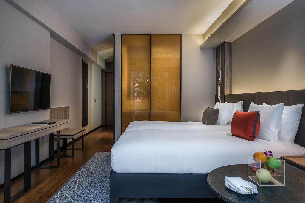 Двухместный (Premium Deluxe Twin Room with Balcony) отеля Pullman Bangkok King Power, Бангкок