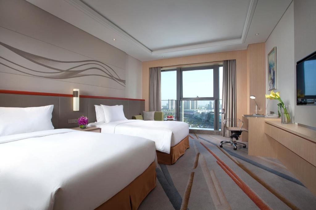 Двухместный (HolidayInn Deluxe King or Twin Room) отеля Holiday Inn Suzhou Huirong Plaza, Сучжоу