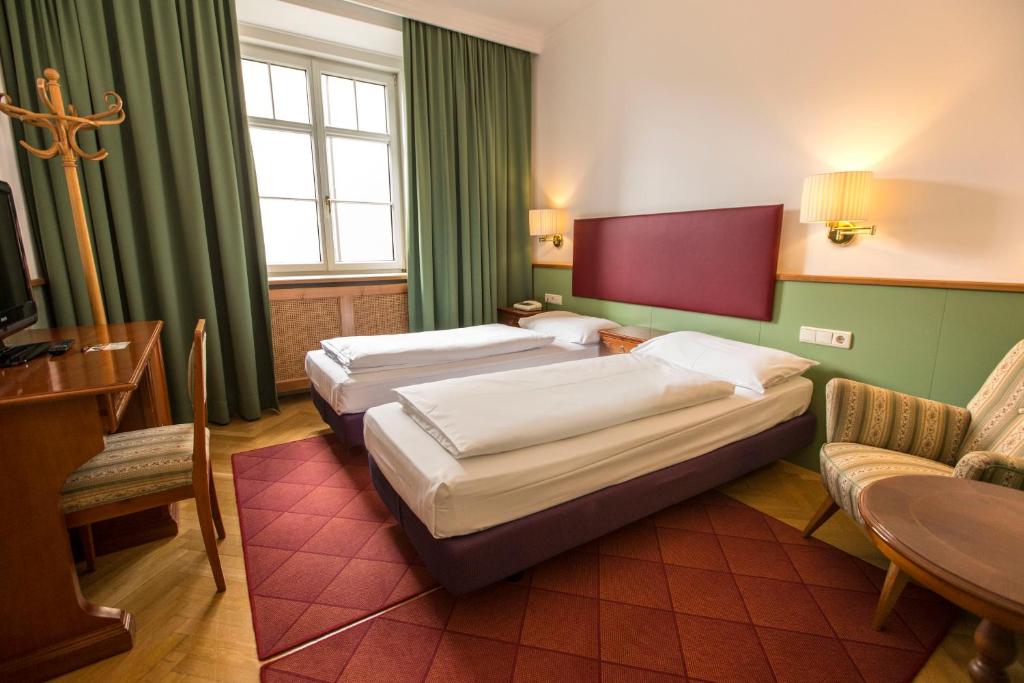 Двухместный (Стандартный двухместный номер с 1 кроватью или 2 отдельными кроватями) отеля Classic Hotel Am Stetteneck, Ортизеи