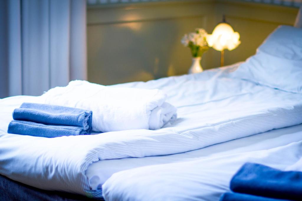Двухместный (Двухместный номер с 1 кроватью или 2 отдельными кроватями и видом на море) отеля Waxholms Hotell, Ваксхольм