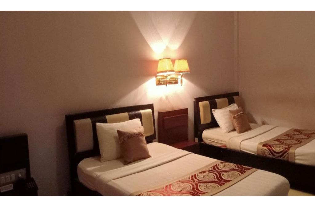 Двухместный (Стандартный двухместный номер с 2 отдельными кроватями) отеля You Eng Hotel, Пномпень