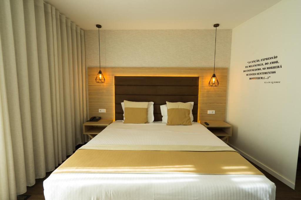 Двухместный (Улучшенный двухместный номер с 1 кроватью или 2 отдельными кроватями) отеля Grande Hotel da Povoa, Повуа-ди-Варзин