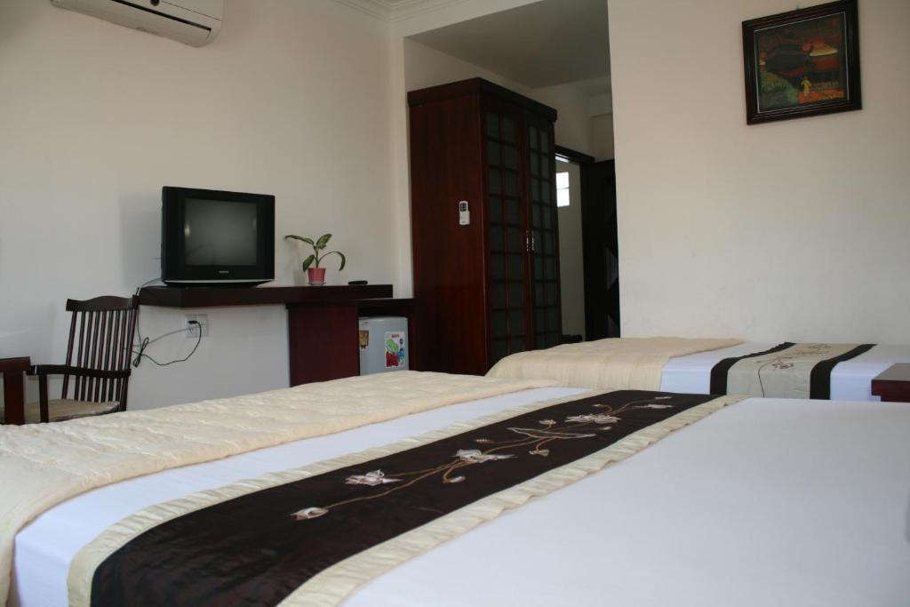 Двухместный (Двухместный номер с 2 отдельными кроватями) отеля Nhiet Doi Hotel, Туихоа