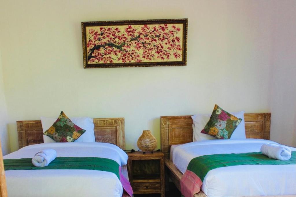 Двухместный (Улучшенный двухместный номер с 2 отдельными кроватями) семейного отеля Putu Homestay, Чангу