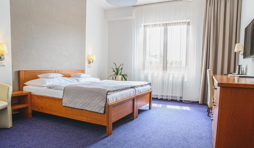 Двухместный (Двухместный номер «Комфорт» с 1 кроватью или 2 отдельными кроватями) отеля Horal, Рожнов-под-Радгоштем