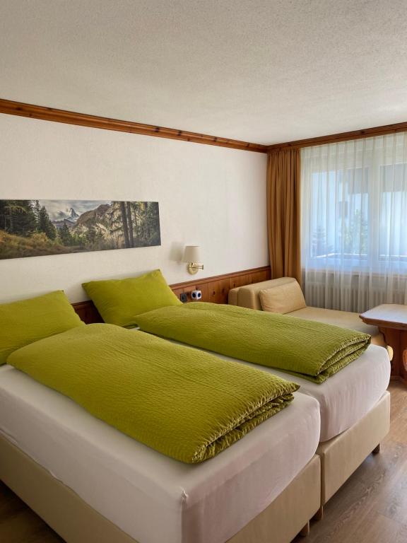 Двухместный (Стандартный двухместный номер с 2 отдельными кроватями) отеля Hotel Adonis, Церматт