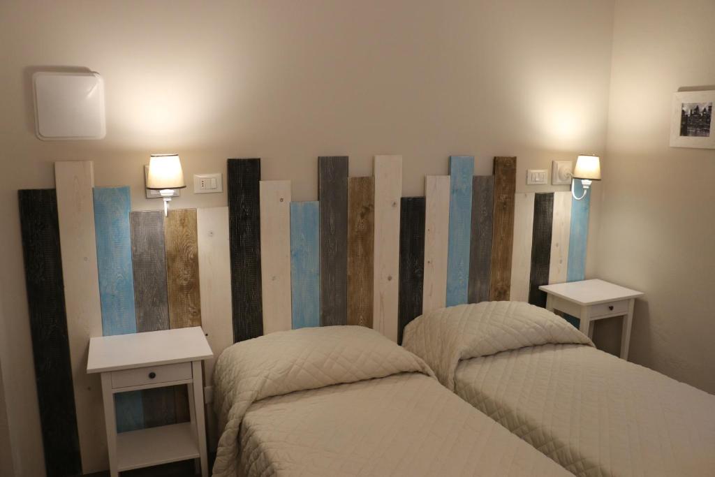 Двухместный (Двухместный номер с 1 кроватью или 2 отдельными кроватями и собственной ванной комнатой) гостевого дома Le Stanze, Болонья