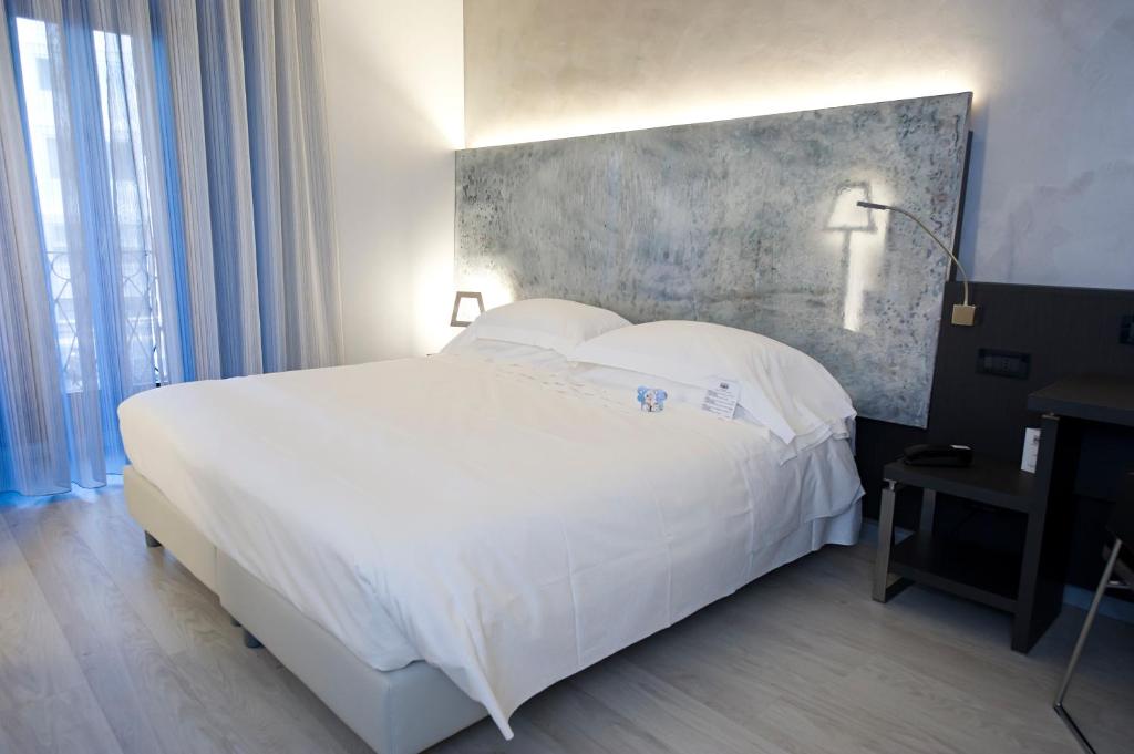 Двухместный (Улучшенный двухместный номер с 1 кроватью или 2 отдельными кроватями) отеля Arli Hotel Business and Wellness, Бергамо