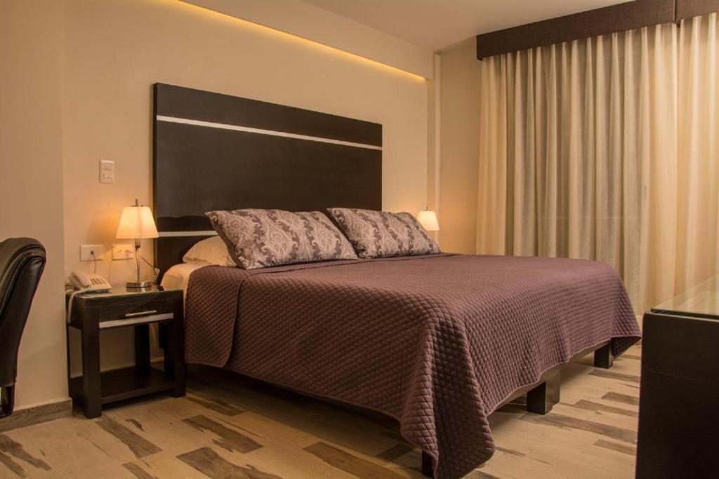 Двухместный (Номер Делюкс с кроватью размера «king-size») отеля Hotel San José Plaza Coatepec, Коатепек