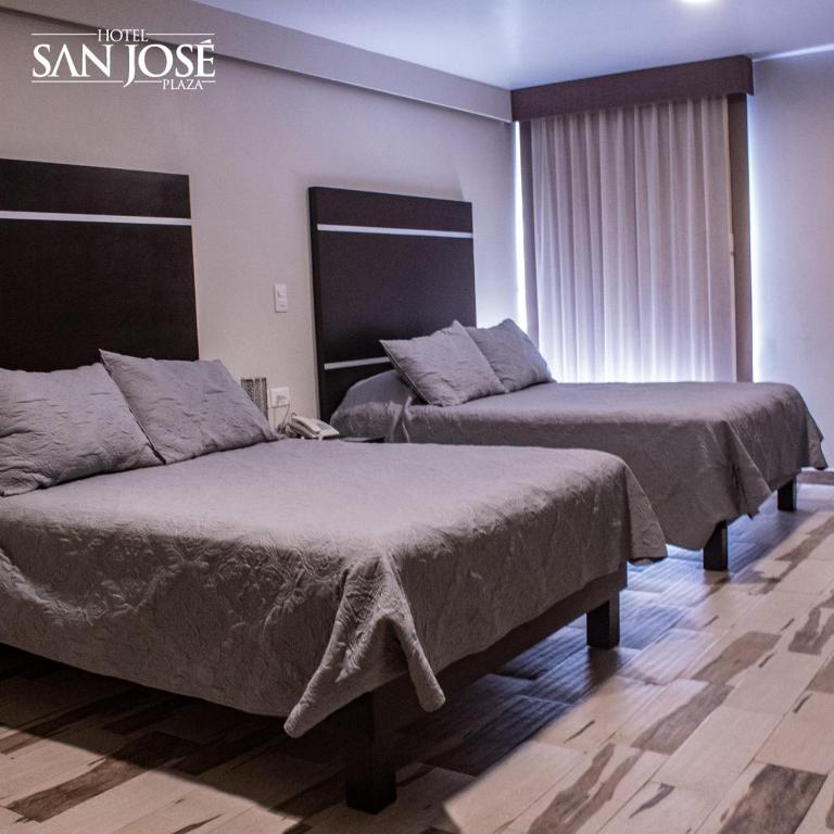 Двухместный (Двухместный номер с 2 двуспальными кроватями) отеля Hotel San José Plaza Coatepec, Коатепек
