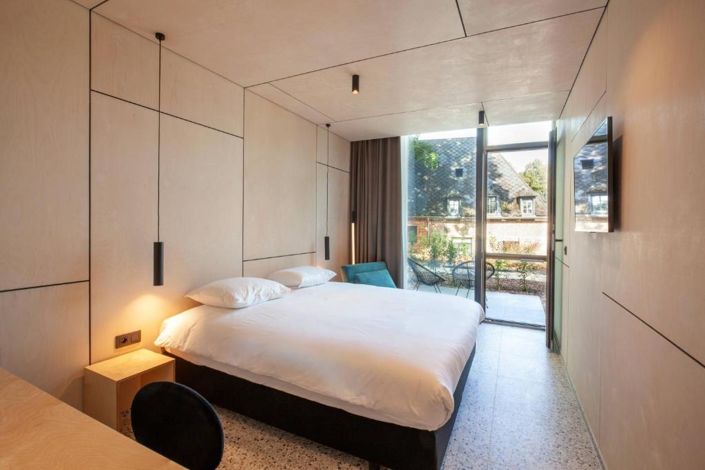 Двухместный (Улучшенный двухместный номер с 1 кроватью или 2 отдельными кроватями и террасой) отеля Hotel The Lodge Heverlee, Левен
