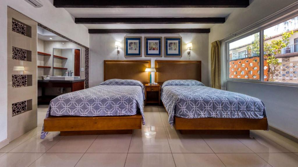 Двухместный (Стандартный двухместный номер с 2 отдельными кроватями) отеля Hotel Casa del Sol, Энсенада
