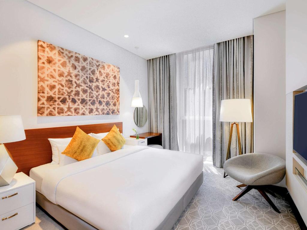 Апартаменты (Апартаменты с 1 спальней) апарт-отеля Grand Mercure Dubai Airport Hotel, Дубай