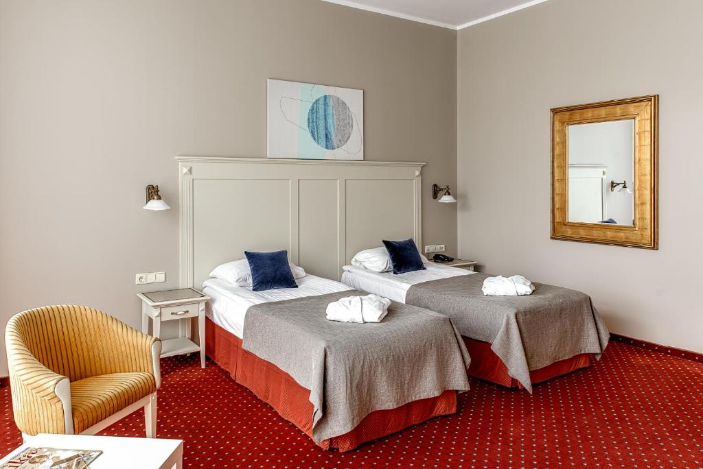 Двухместный (Улучшенный двухместный номер с 2 отдельными кроватями и доступом в спа-центр) отеля Europa Royale Druskininkai, Друскининкай