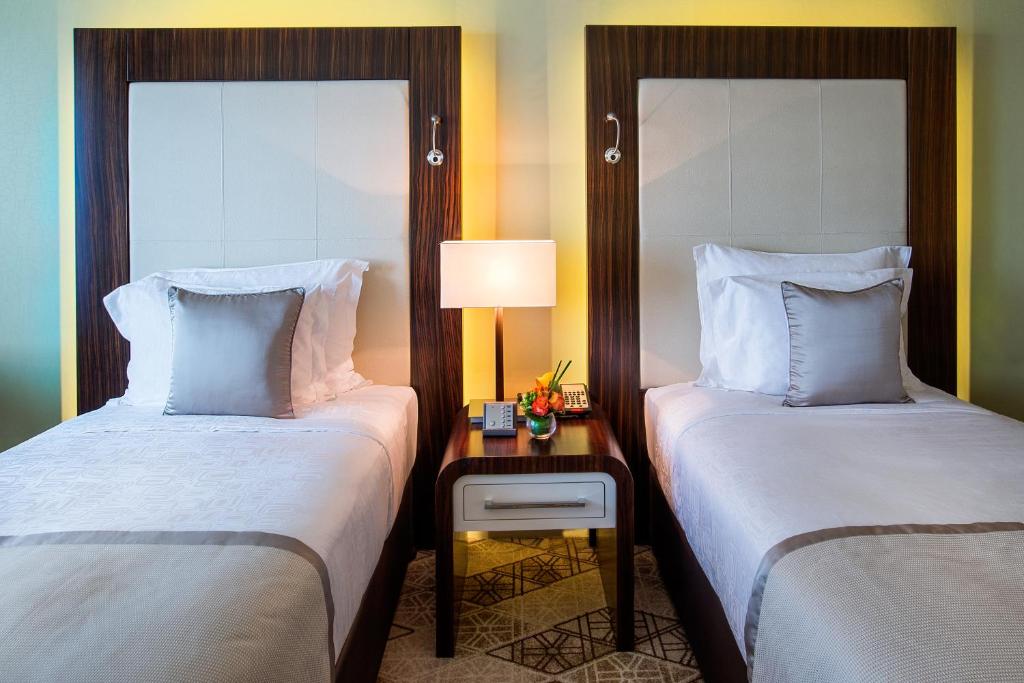 Двухместный (Стандартный двухместный номер с 2 отдельными кроватями) отеля Auris Plaza Hotel, Дубай