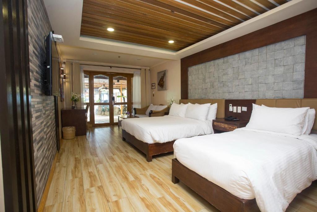 Двухместный (Двухместный номер Делюкс с 1 кроватью или 2 отдельными кроватями) отеля Red Coconut Beach Hotel Boracay, Боракай