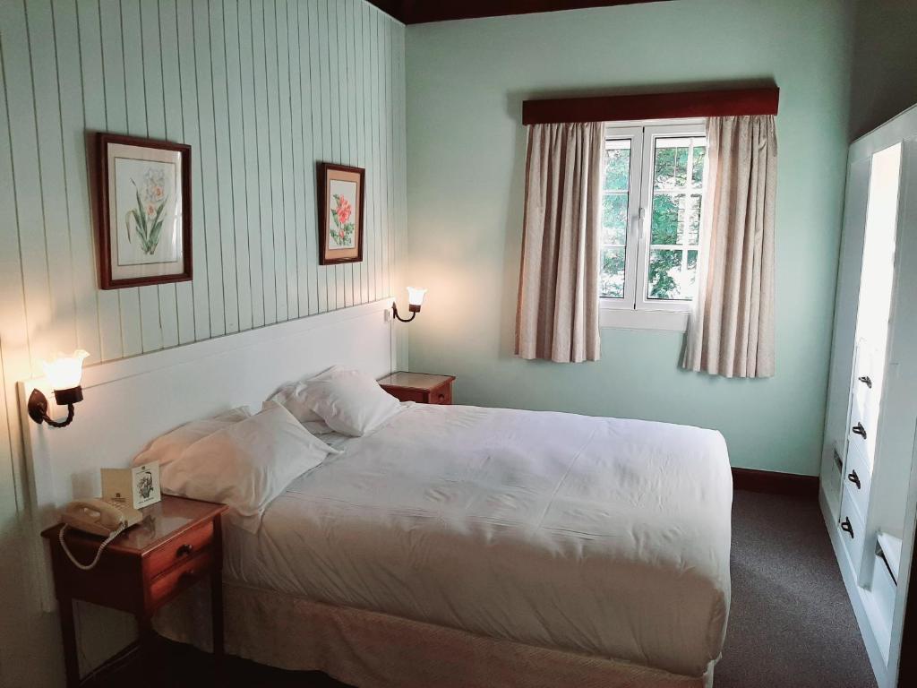 Двухместный (Двухместный номер в мансарде с 2 отдельными кроватями - Вид на сад) отеля Quinta Da Penha De Franca, Фуншал