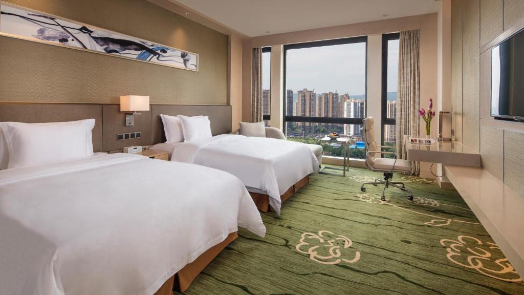 Трехместный (Клубный двухместный номер с 2 отдельными кроватями) отеля Holiday Inn Chongqing University Town, Чунцин