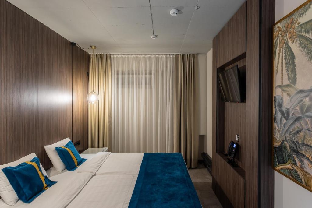 Двухместный (Бюджетный двухместный номер с 1 кроватью или 2 отдельными кроватями – Цокольный этаж) отеля Vila Tulip, Кишинев