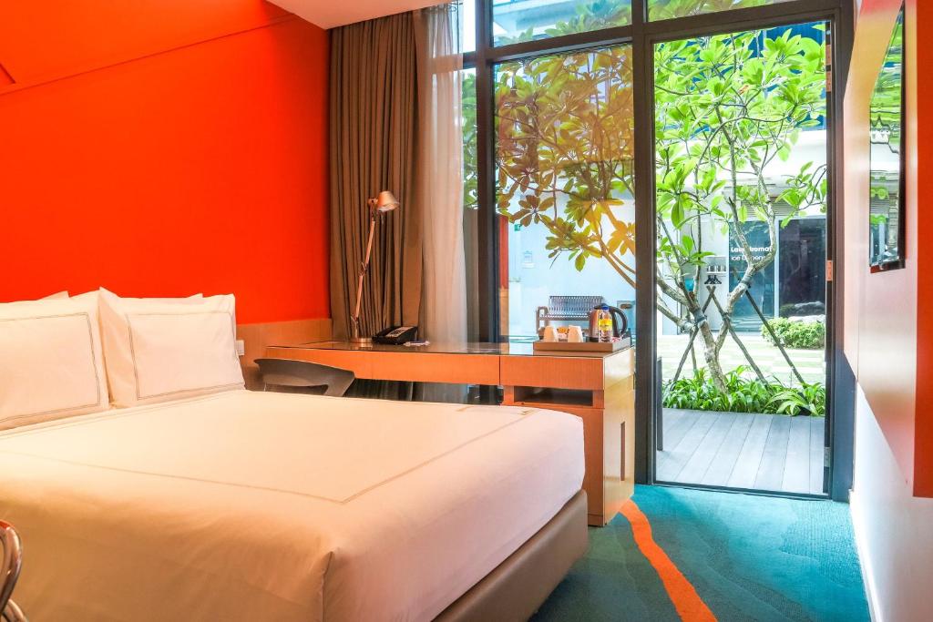 Двухместный (Номер с кроватью размера «queen-size» и патио — Для некурящих) отеля Days Hotel Singapore at Zhongshan Park, Сингапур (город)