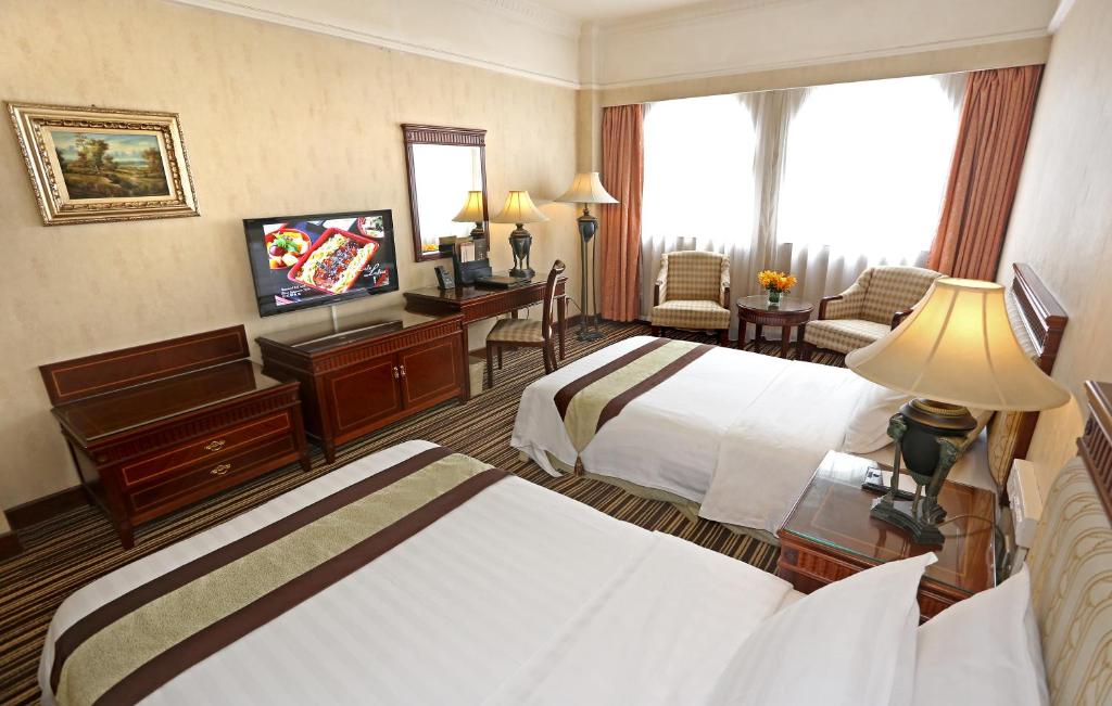 Двухместный (Специальное предложение - Стандартный двухместный номер с 2 отдельными кроватями) отеля Grand Palace Hotel - Grand Hotel Management Group, Гуанчжоу