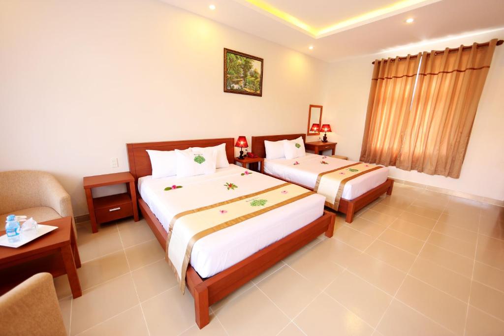 Двухместный (Номер Делюкс с видом на сад) курортного отеля Madame Cuc Saigon Emerald Resort, Фантхьет