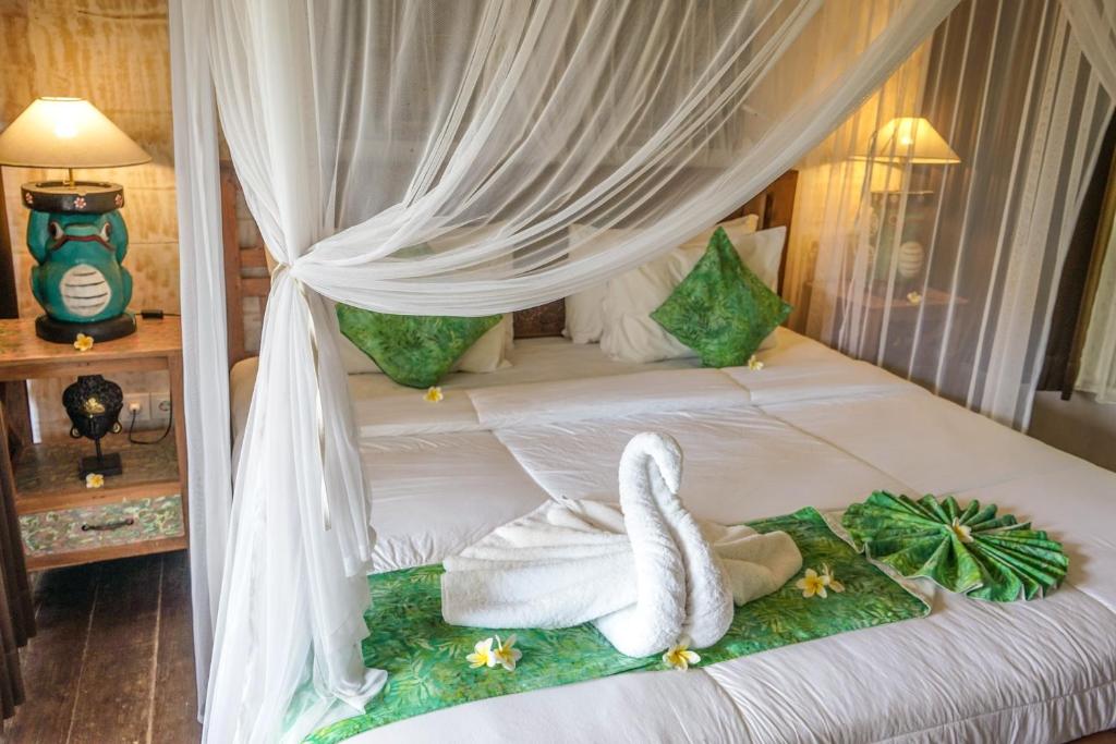 Двухместный (Номер Делюкс с кроватью размера «queen-size») курортного отеля KTS Authentic Balinese Villas, Чангу