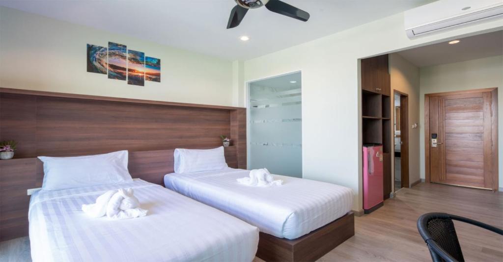 Двухместный (Двухместный номер с 2 отдельными кроватями и видом на бассейн) отеля Peace Blue Naiharn Naturist Resort Phuket, Пхукет