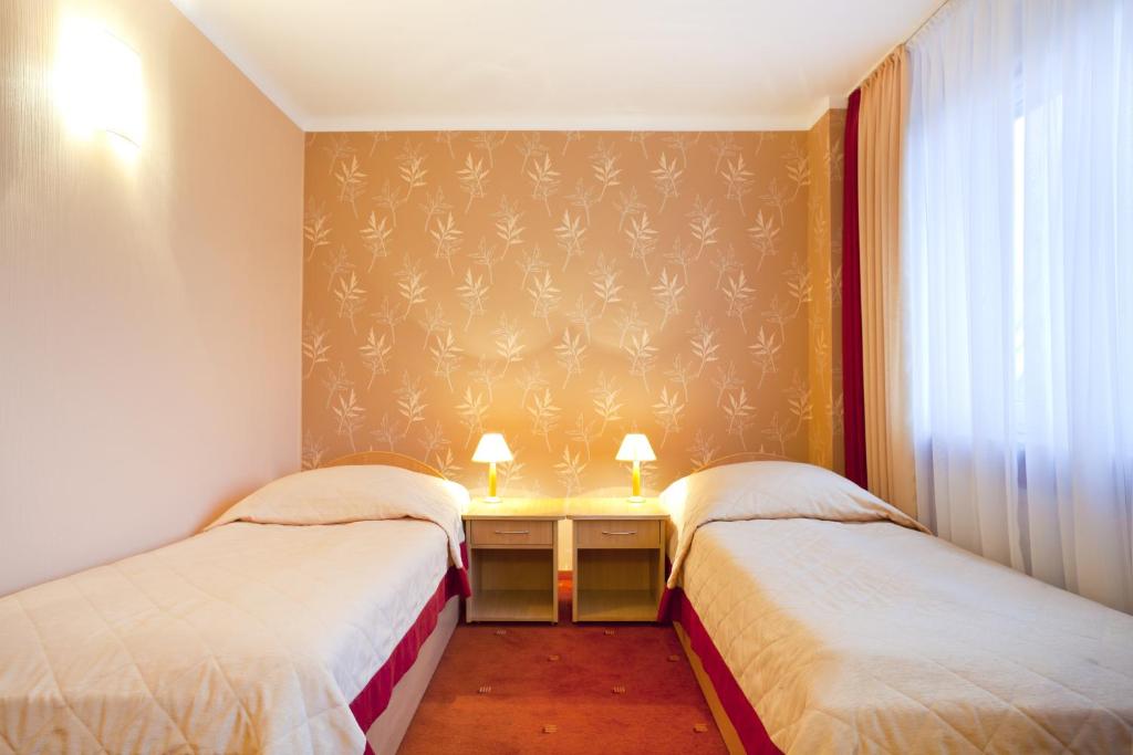 Двухместный (Стандартный двухместный номер с 2 отдельными кроватями) отеля Huzar, Люблин