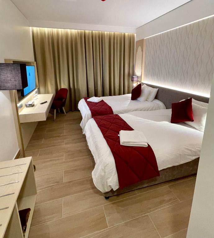 Двухместный (Стандартный двухместный номер с 2 отдельными кроватями) отеля Falaj Daris Hotel, Низва