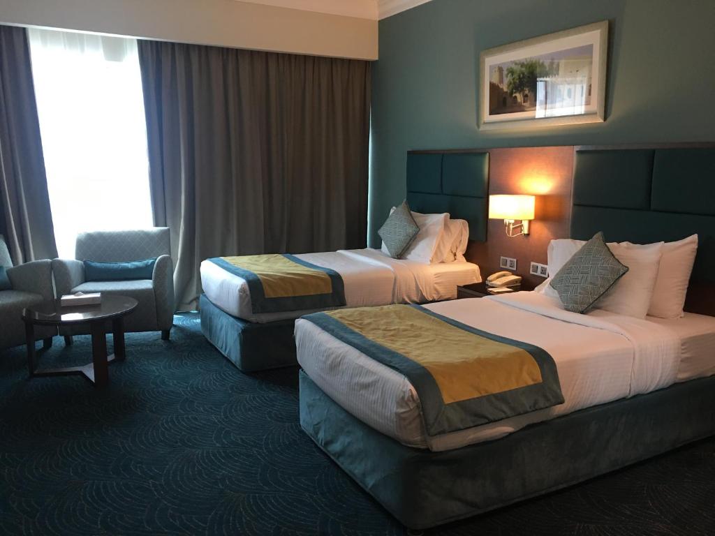 Двухместный (Улучшенный двухместный номер с 2 отдельными кроватями) отеля City Seasons Hotel Dubai, Дубай