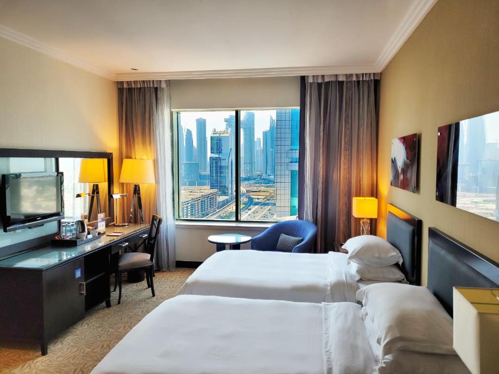 Двухместный (Стандартный двухместный номер с 2 отдельными кроватями) отеля Towers Rotana - Dubai, Дубай