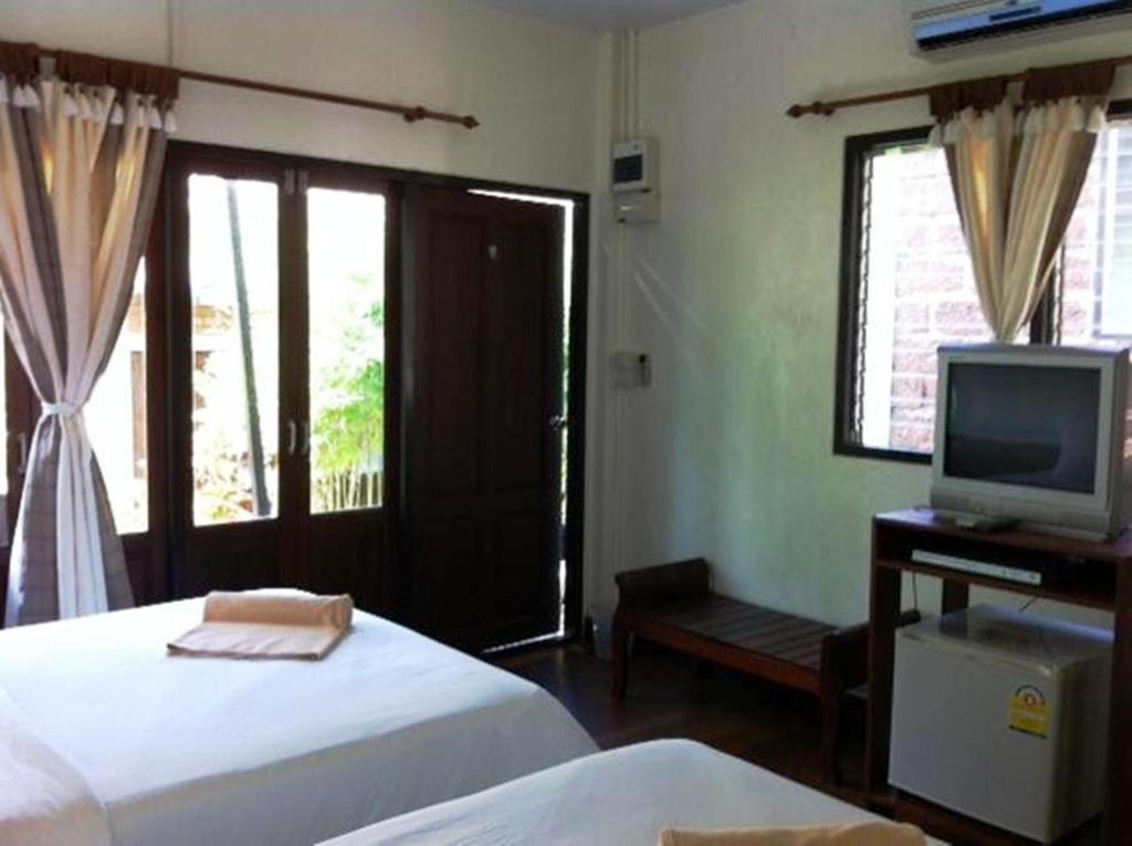 Двухместный (Стандартный коттедж с 2 отдельными кроватями) курортного отеля Sunset Cove Resort, Пханган