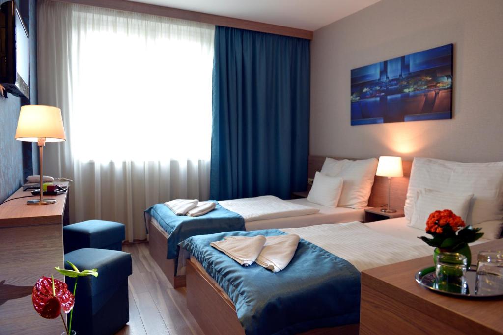 Двухместный (Стандартный двухместный номер с 1 кроватью или 2 отдельными кроватями) отеля Vitta Hotel Superior Budapest, Будапешт